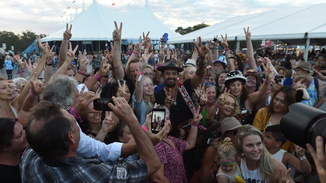 Michael Franti performs out in the general area with crowds at Bluesfest 2018 in Tyagarah.