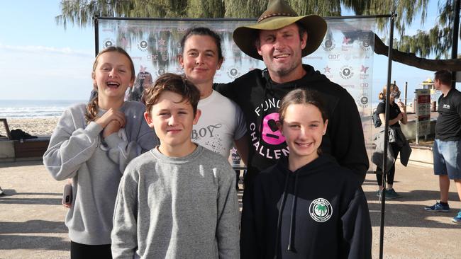 Chris Walker reunites with wife Courtney and children Harper, 13, and twins Chase and Narla, 10. Picture: Glenn Hampson.