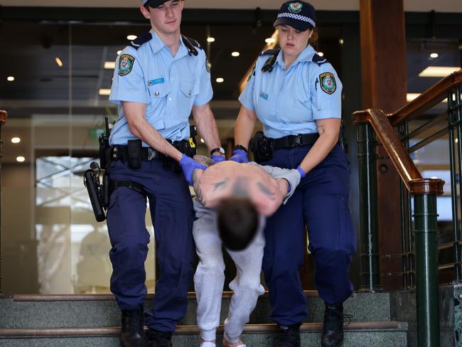 NSW Police arrest a second man in relation to an alleged attack on a synagogue in Newtown.