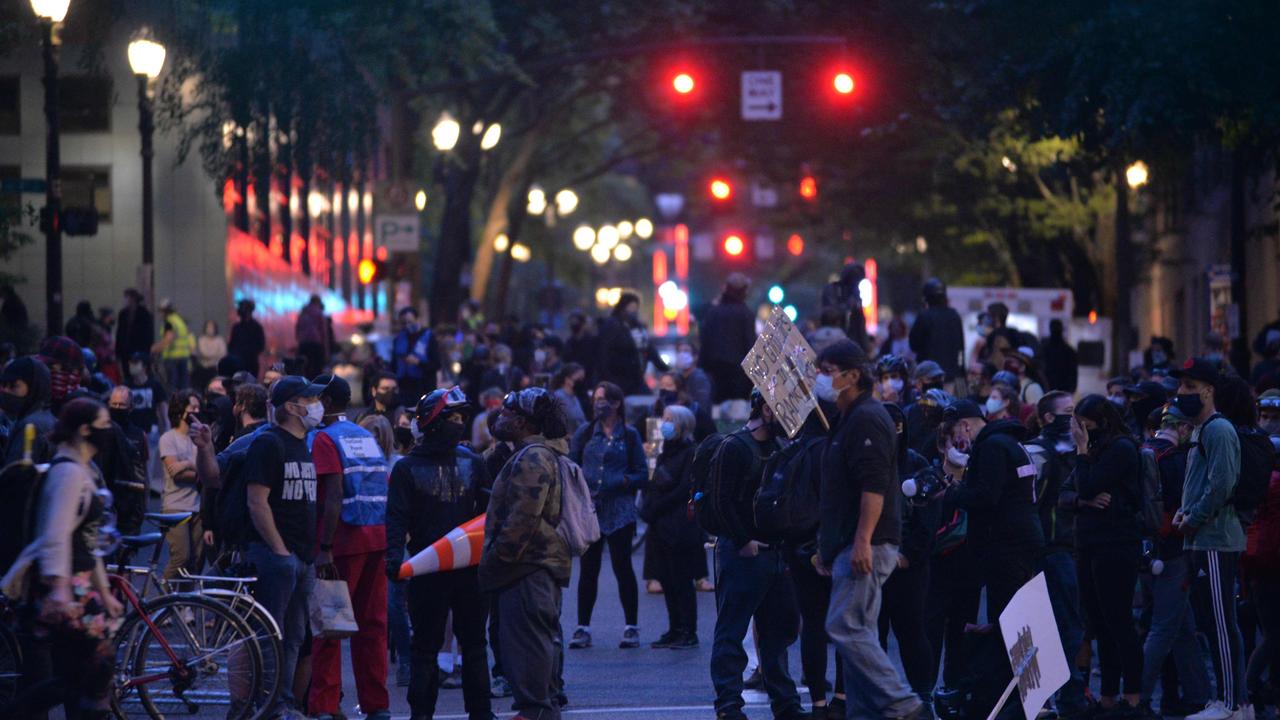 People protest during a demonstration in front of the Multnomah County Justice Center in Portland, Oregon, on July 17, 2020. Picture: Ankur Dholakia/AFP