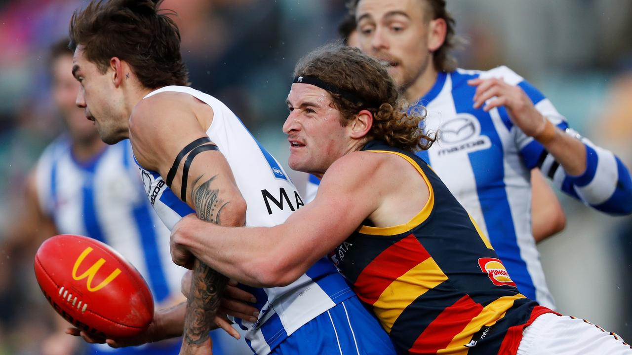 Berry brings down Jy Simpkin at Blundstone Arena in Hobart last weekend. Picture: Dylan Burns/AFL Photos via Getty Images