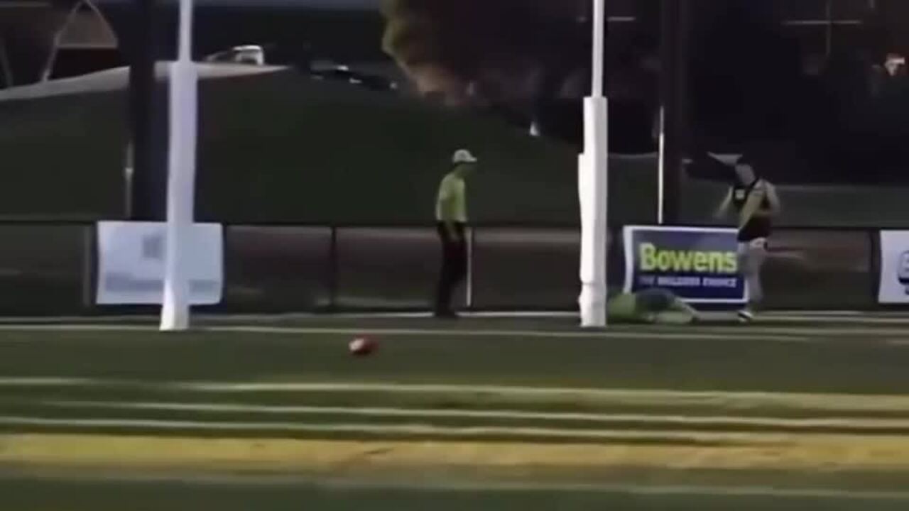 Umpire cops brutal falcon in local footy match