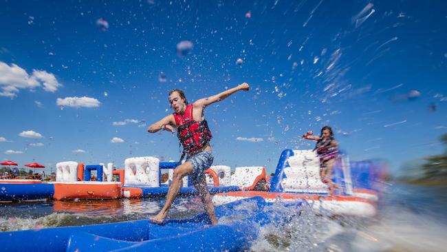 The popular summer attraction features a wakeboarding, high ropes and inflatable obstacle course. Picture: Jason Edwards