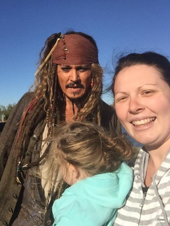 Kaylym Ludwig with two-year-old daughter Chelsea, took a selfie with Johnny Depp at Raby Bay. Picture: Supplied