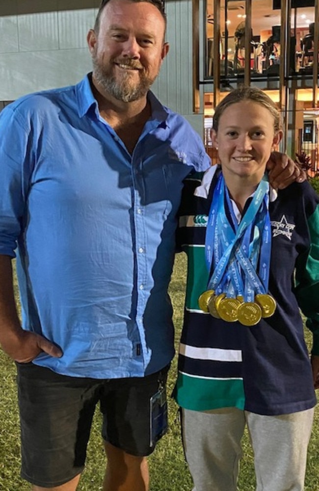 Rocky City Swimming Club coach Shane Kingston and star performer Taryn Roberts.