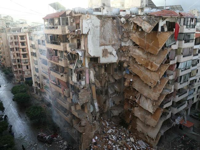 A picture shows a damaged building at the site of overnight Israeli air strikes that targeted Tayouneh area of Beirut’s suburbs. Picture: AFP