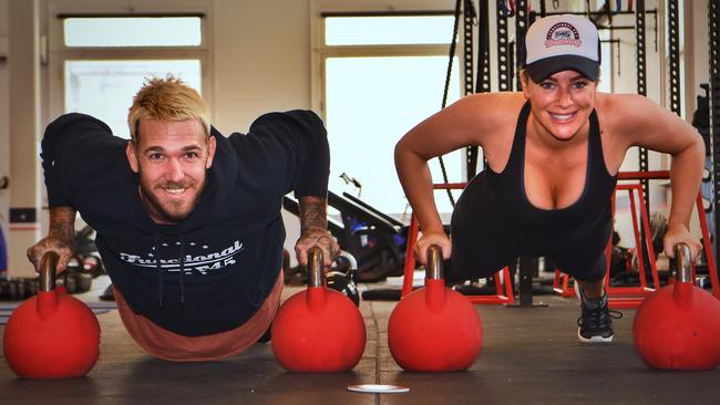 Swan, with Ash Pollard, is keeping fit with the F45 craze. Picture: Tony Gough