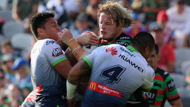 Tom Burgess on the charge for the Rabbitohs against the Raiders.