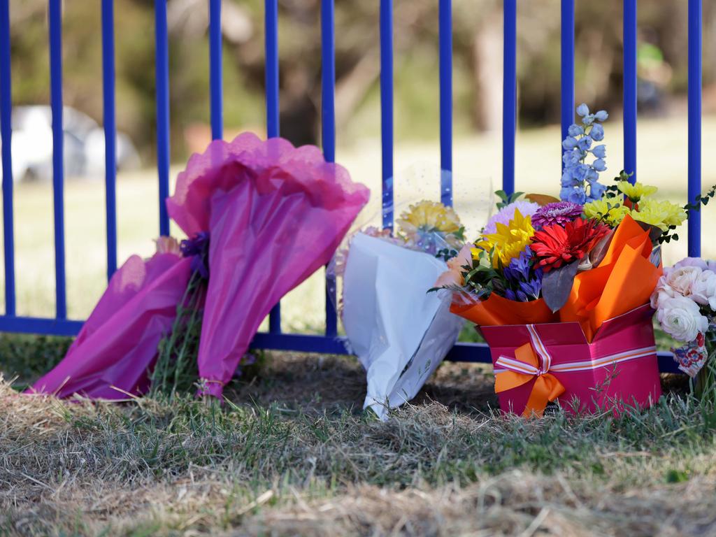 Flowers were been laid at school after the tragedy happened. Picture: Grant Viney