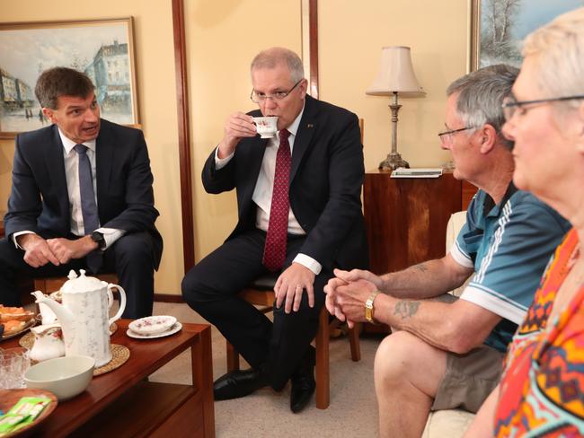 Energy Minister Angus Taylor and Prime Minister Scott Morrison meeting Canberra residents this morning to talk about their power bills. Picture: Kym Smith