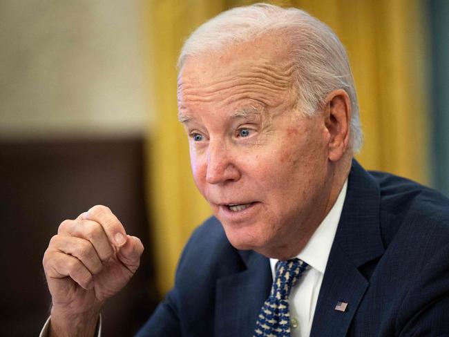 US President Joe Biden speaks during a briefing on the winter storm system traversing the US and the expected impacts, in the Oval Office of the White House in Washington, DC, on December 22, 2022. (Photo by Brendan Smialowski / AFP)