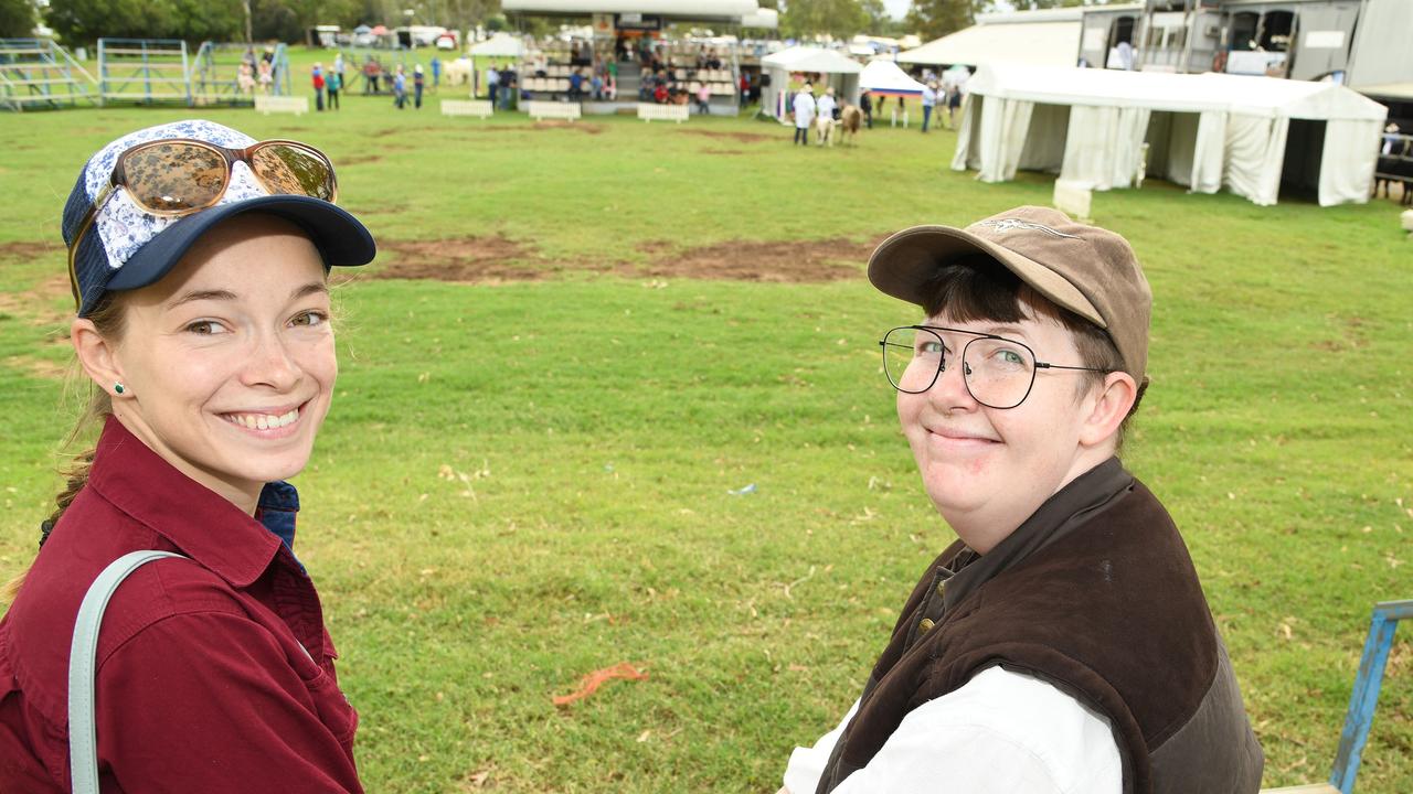 Kate Kemp and Kristen Swindlehurst watch the cattle judging at the Heritage Bank Toowoomba Royal Show. Saturday March 26, 2022