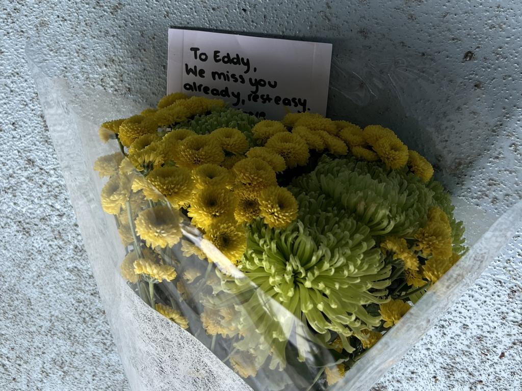 A floral tribute is placed at the Melbourne Grammar boat shed in honour of Ed. Picture: Supplied