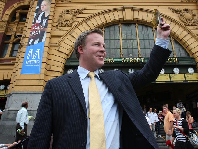 Will Hodgman, Leader of the Tasmanian State Opposition, spruiking at Flinders Street Station to get people to move to Tasmania with an offer of cash money. Flinders St Station.
