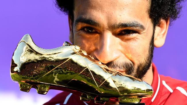 LIVERPOOL, ENGLAND - MAY 13:  Mohamed Salah of Liverpool pose for a photo with his Premier League Golden Boot Award after the Premier League match between Liverpool and Brighton and Hove Albion at Anfield on May 13, 2018 in Liverpool, England.  (Photo by Michael Regan/Getty Images) *** BESTPIX ***