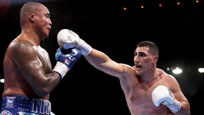 Justis Huni (right) was well ahead on the scorecards. (Steven Paston/PA via AP)