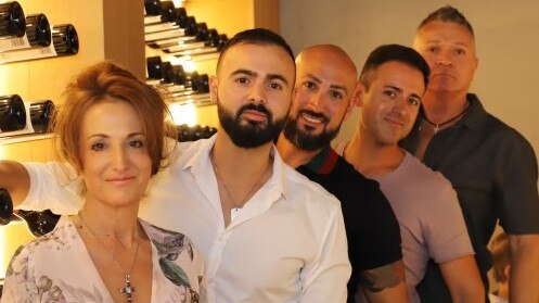 Gabriella, Julian, Ricardo, Gianni and Giorgio Cavuoto at their well-known The Parade restaurant, European Cafe. Picture: Supplied