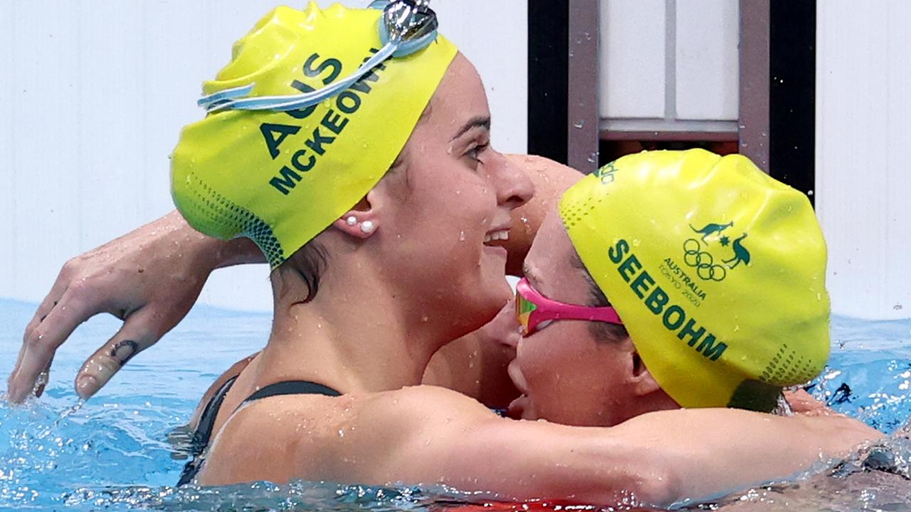 Kaylee McKeown congratulates Emily Seebohm on her final Olympic swim.