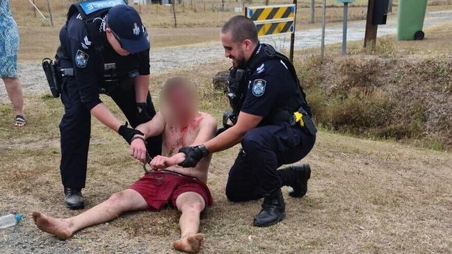 Police arrest a man after the Peak Downs Hwy drama at Greenmount, west of Mackay.