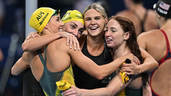 Gold medallists Emma McKeon, Meg Harris, Shayna Jack and Mollie O’Callaghan celebrate after the final of the women’s 4x100m freestyle relay at the Paris 2024 Olympic Games. Picture: AFP