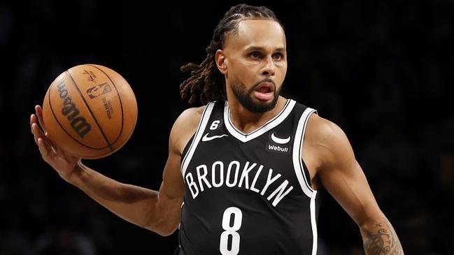 NEW YORK, NEW YORK - JANUARY 30: Patty Mills #8 of the Brooklyn Nets dribbles during the second half against the Los Angeles Lakers at Barclays Center on January 30, 2023 in the Brooklyn borough of New York City. The Nets won 121-104. NOTE TO USER: User expressly acknowledges and agrees that, by downloading and/or using this photograph, User is consenting to the terms and conditions of the Getty Images License Agreement. (Photo by Sarah Stier/Getty Images)