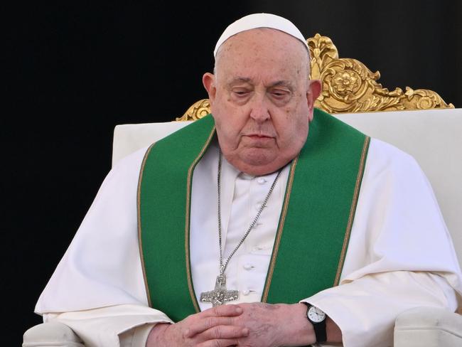 (FILES) Pope Francis celebrates the mass for the Jubilee of the Armed Forces at St. Peter's square in the Vatican on February 9, 2025. The Vatican on February 18, 2025 cancelled two of Pope Francis's events at the weekend as the 88-year-old continues to receive hospital treatment for bronchitis. (Photo by Alberto PIZZOLI / AFP)