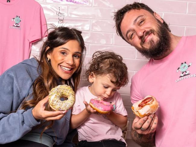 Josh Rivers, partner Chimere and their son Lando. Landough's donut shop on Jetty Rd, Glenelg is closing due to cost of living. Picture: Facebook