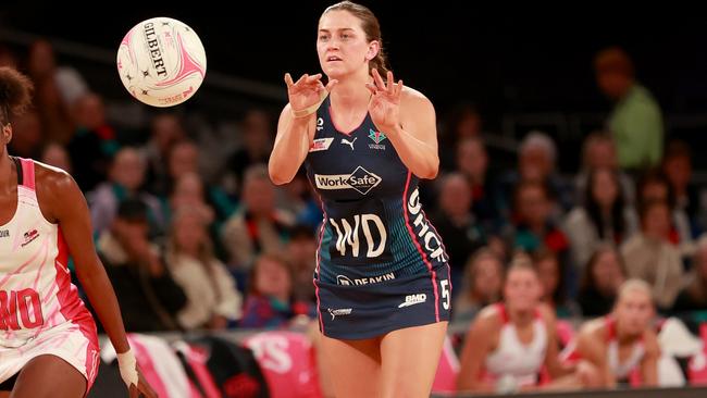 MELBOURNE, AUSTRALIA - APRIL 20: Kate Eddy of the Vixens passes the ball during the round two Super Netball match between Melbourne Vixens and Adelaide Thunderbirds at John Cain Arena, on April 20, 2024, in Melbourne, Australia. (Photo by Kelly Defina/Getty Images)