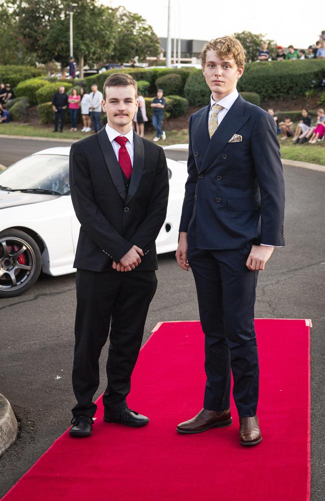 Graduate Connor Martin (right) and partner Gene Thiselton at Mary MacKillop Catholic College formal at Highfields Cultural Centre, Thursday, November 14, 2024. Picture: Kevin Farmer