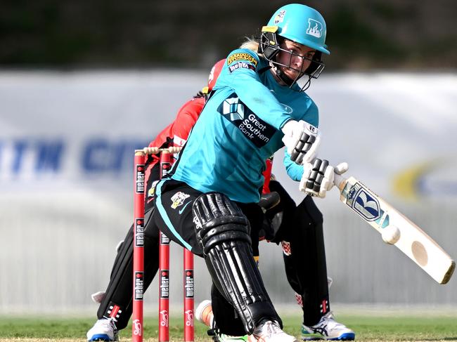 MACKAY, AUSTRALIA - OCTOBER 18: Georgia Redmayne of the Heat hits the ball to the boundary for a four during the Women's Big Bash League match between the Brisbane Heat and the Melbourne Renegades at Great Barrier Reef Arena, on October 18, 2022, in Mackay, Australia. (Photo by Bradley Kanaris/Getty Images)