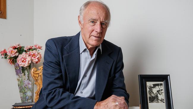 Bob Ward with a picture of his father and grandfather — both of whom lied about their age so they could enlist. Picture: David Swift