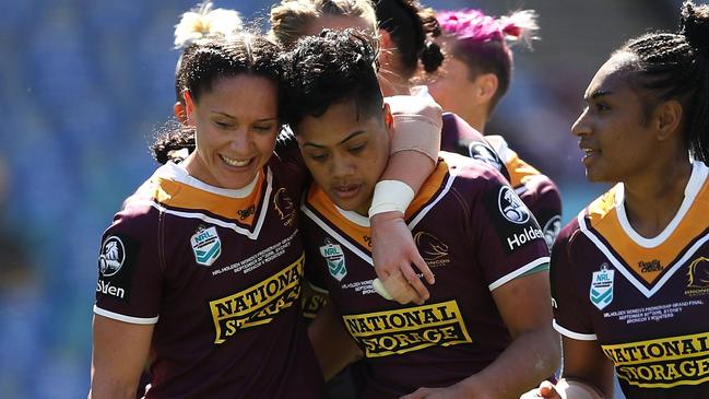 Kimiora Nati celebrates one of her tries with her Broncos teammates. Picture: Getty Images