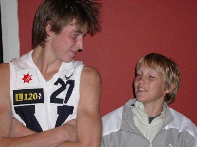 A newly drafted Ben Reid with younger brother Sam in 2006.