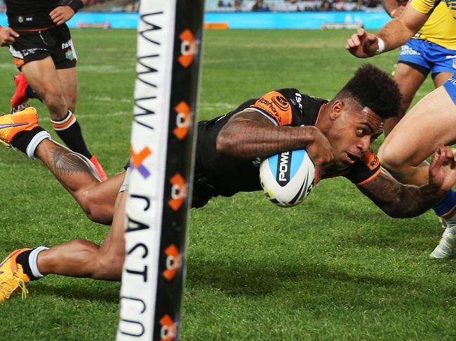 Tigers' Kevin Naiqama scores a great try in the corner during NRL match Wests Tigers v Parramatta Eels at ANZ Stadium. picture. Phil Hillyard