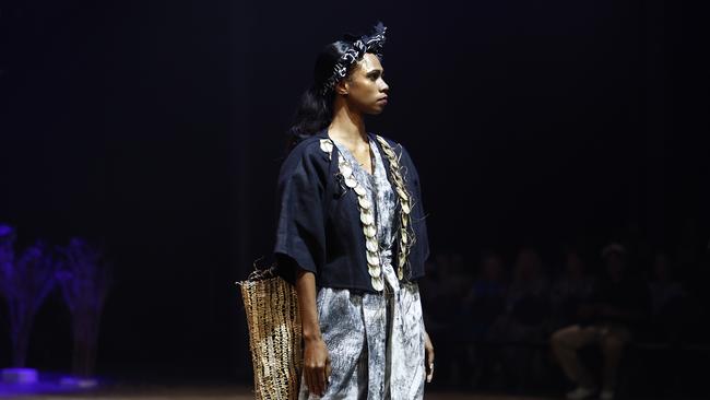 A model wears a Delvene Cockatoo-Collins design at the Cairns Indigenous Art Fair fashion performance, Woven, held at the Tanks Arts Centre, Edge Hill. Picture: Brendan Radke