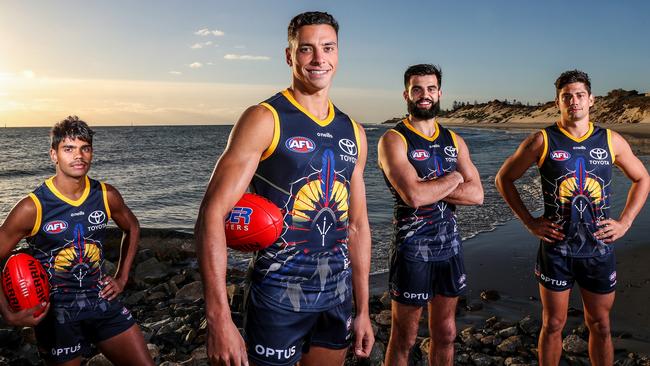 Milera with teammates Tariek Newchurch, Ben Davis and Shane McAdam in this year’s Indigenous guernsey. Picture: Sarah Reed