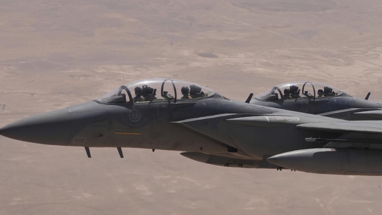 Saudi Air Force F-15 warplanes escort Air Force One carrying President Donald Trump as it arrives in Saudi Arabia. Picture: AP