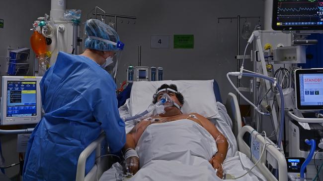 A nurse cares for a COVID-19 patient at St Vincent’s Hospital in Sydney. Picture: Kate Geraghty