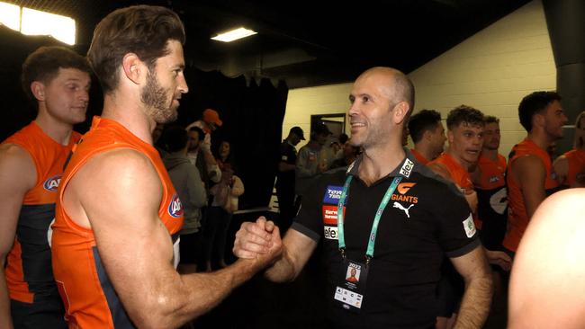 Mark McVeigh has a strong rapport with the Giants’ players, including Callan Ward. Picture: Phil Hillyard