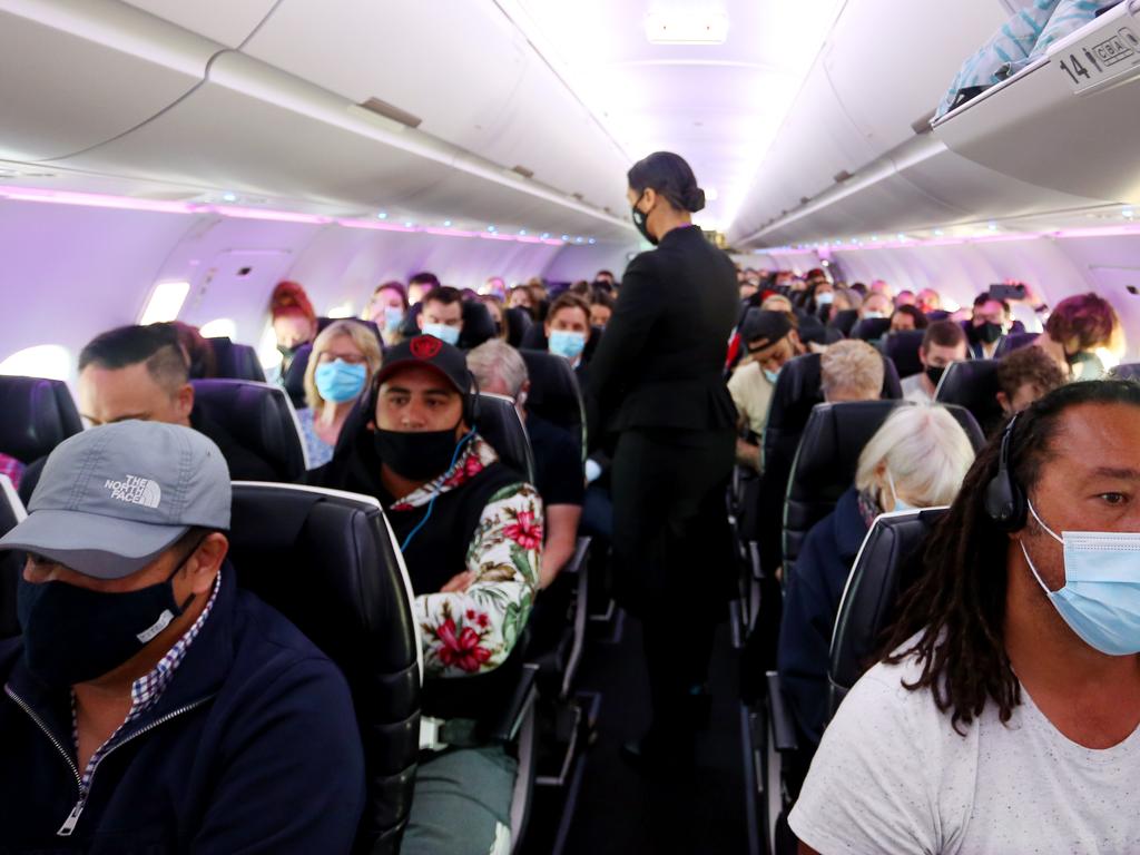 Passengers were seen boarding Air New Zealand flight 246 bound for Wellington on Monday as the trans-Tasman travel bubble between New Zealand and Australia began. Picture: Lisa Maree Williams/Getty Images