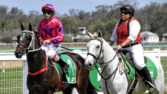 Jockey Adin Thompson returns to the Ipswich enclosure after his winning ride aboard Devil's Temptation. Picture: Rob Williams