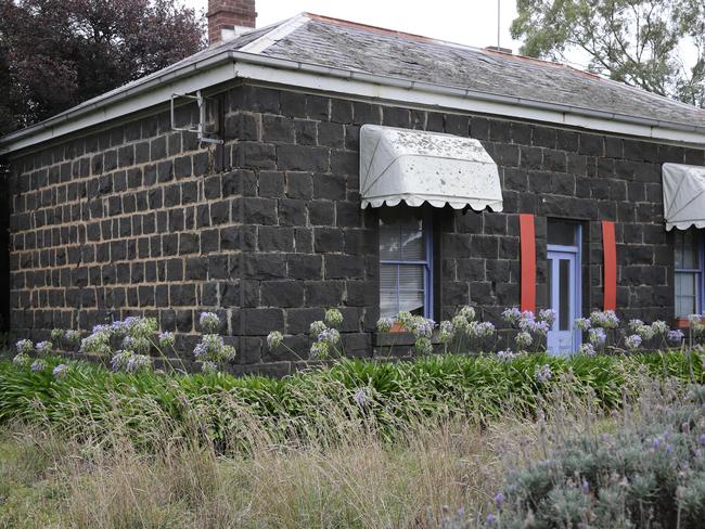 Marshall Bluestone Cottage Community Group and  spokesperson Virginia Johnson, centre, oppose the demolition of a 150 year old bluestone cottage as part of the Barwon Heads Rd duplication. It is located on the corner of Barwon Heads and Tannery Roads, Marshall.  Picture: Peter Ristevski