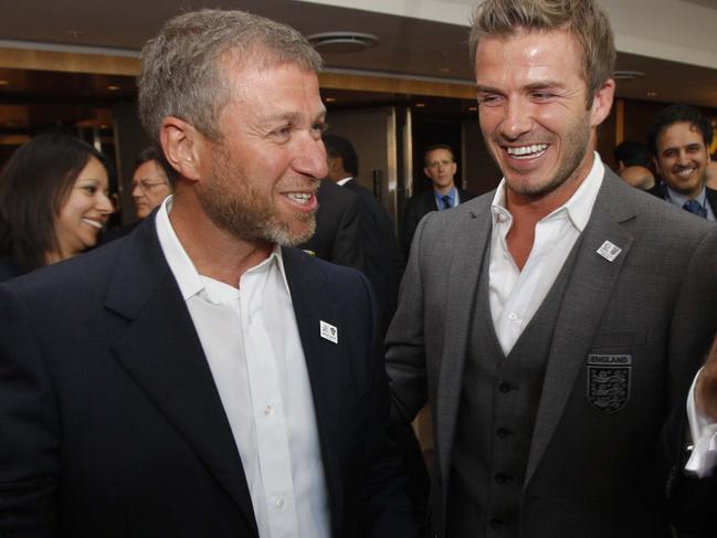 Russian billionaire oligarch and Chelsea owner Roman Abramovich speaking to David Beckham.