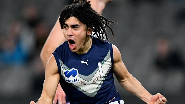 MELBOURNE, AUSTRALIA - JULY 14: Isaac Kako of Victoria Metro celebrates kicking a goal during the 2024 Marsh AFL Championships U18 Boys match between Victoria Metro and Victoria Country at Marvel Stadium on July 14, 2024 in Melbourne, Australia. (Photo by Josh Chadwick/AFL Photos)