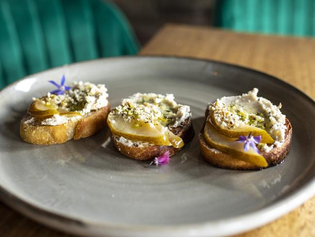 Toast generously topped with marrow spread and slices pear. Picture: Eddie Safarik