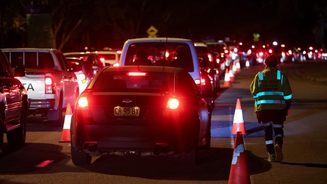 The extensive queues at the Fairfield Showground drive-through Covid testing clinic on Wednesday night. Picture: Justin Lloyd.