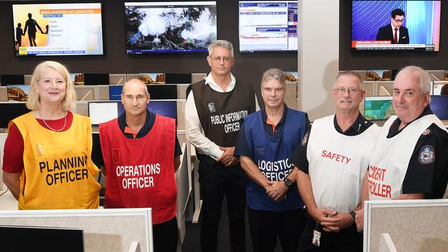 The new Territory Emergency Operations Centre at the Peter McAulay Centre ... from left, planning officer Annette Turner Duggan, operations officer Mark Fishlock, logistics officer Brian Hennessy, safety officer Mark Cunnington and incident controller Robert Evans. Picture: Katrina Bridgeford