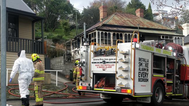 Hobart, Bridgewater and Glenorchy fire crews attended the house fire in Quayle Street, Sandy Bay. Picture: Annie McCann