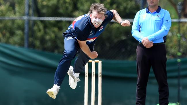 Bowler Jake Reed belts down a fast delivery for Footscray. Picture: Steve Tanner