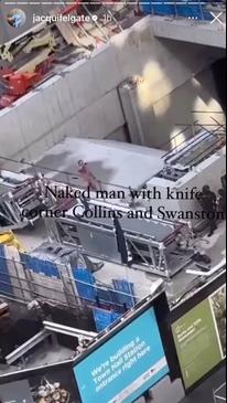 Naked man scales Melbourne building with knife